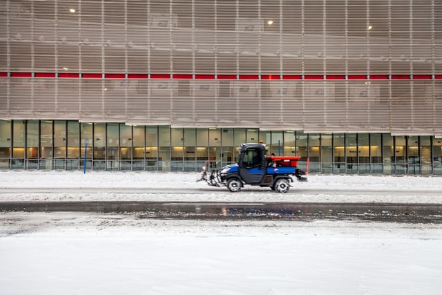 types of ATVs; a utility vehicle on a road with snow on both sides