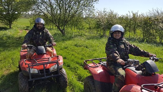 Valentines day date; couple enjoying their time at a quad bike safari
