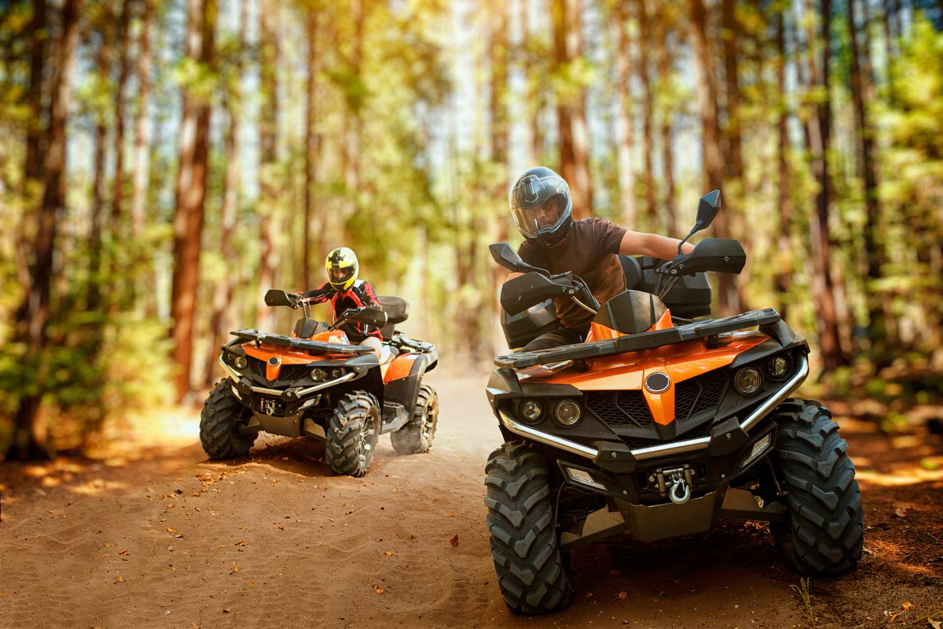 Father's Day adventure gifts, Father and son riding quad bikes in the woods