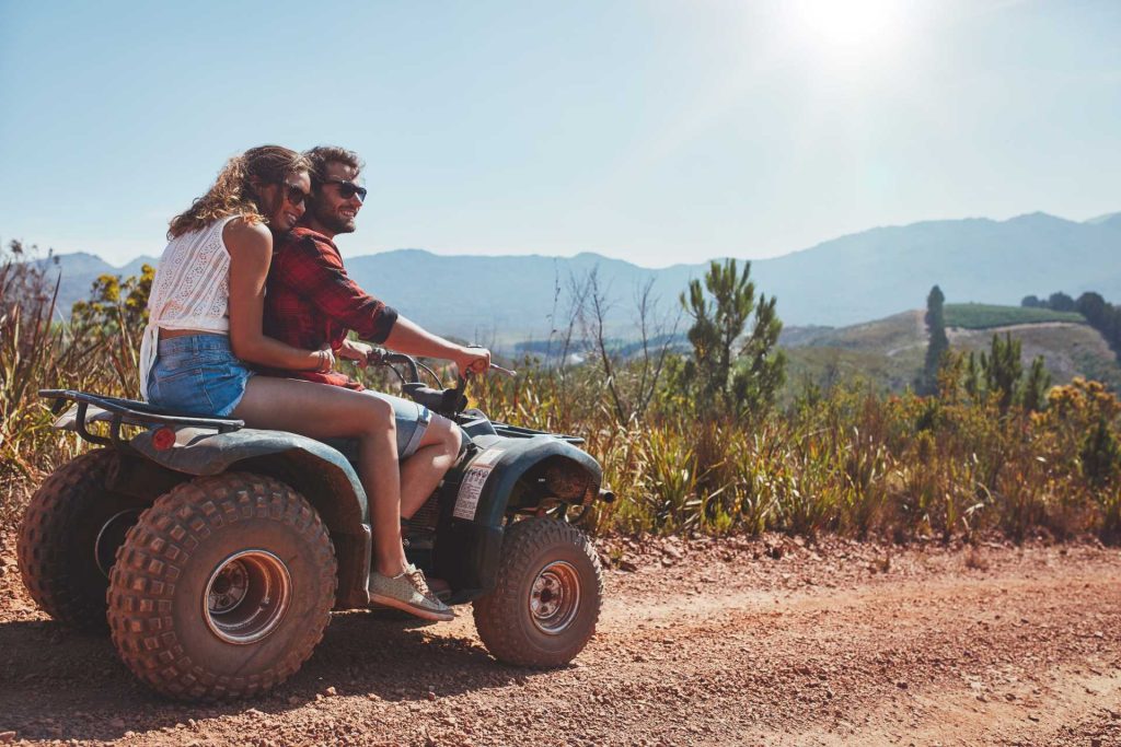 date outside, couple on quad bike