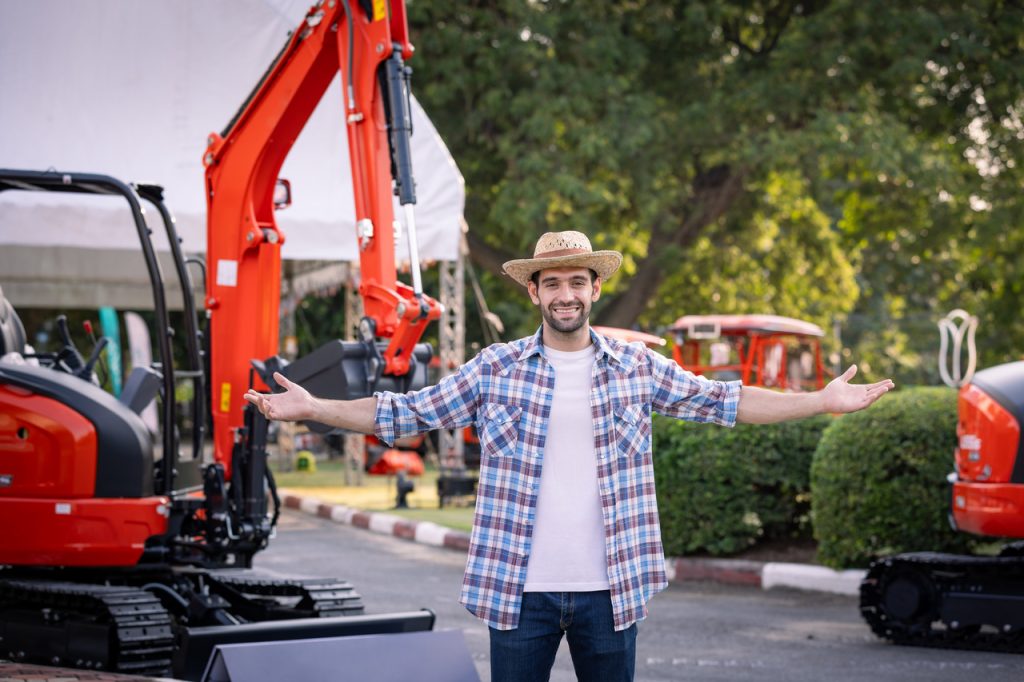 A groom after enjoying a digger driving experience as part of his stag-do party
