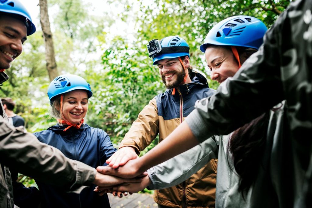memorable corporate day out for large groups, a group of people preparing for an outdoor activity