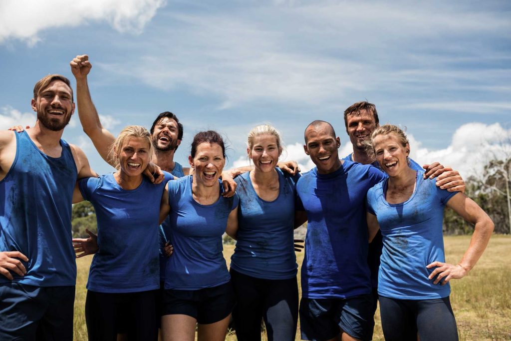 activity-based learning for teams, A group of people posing for the camera.