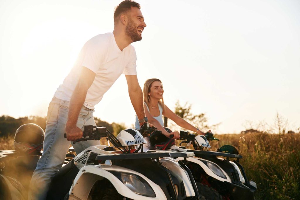 valentine's outdoor date, A man and a woman riding ATVs