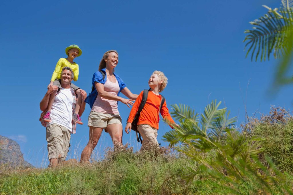 A shot of a family hiking in the outdoors
