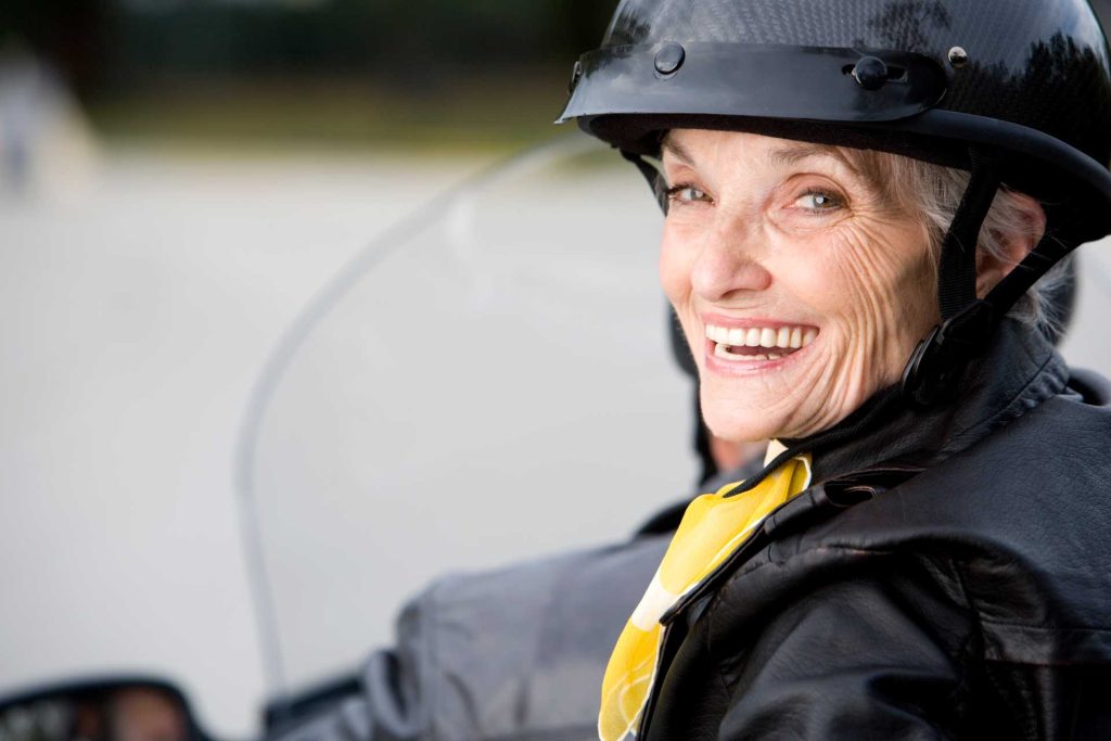 Mother's Day activity ideas, A senior woman riding a bike