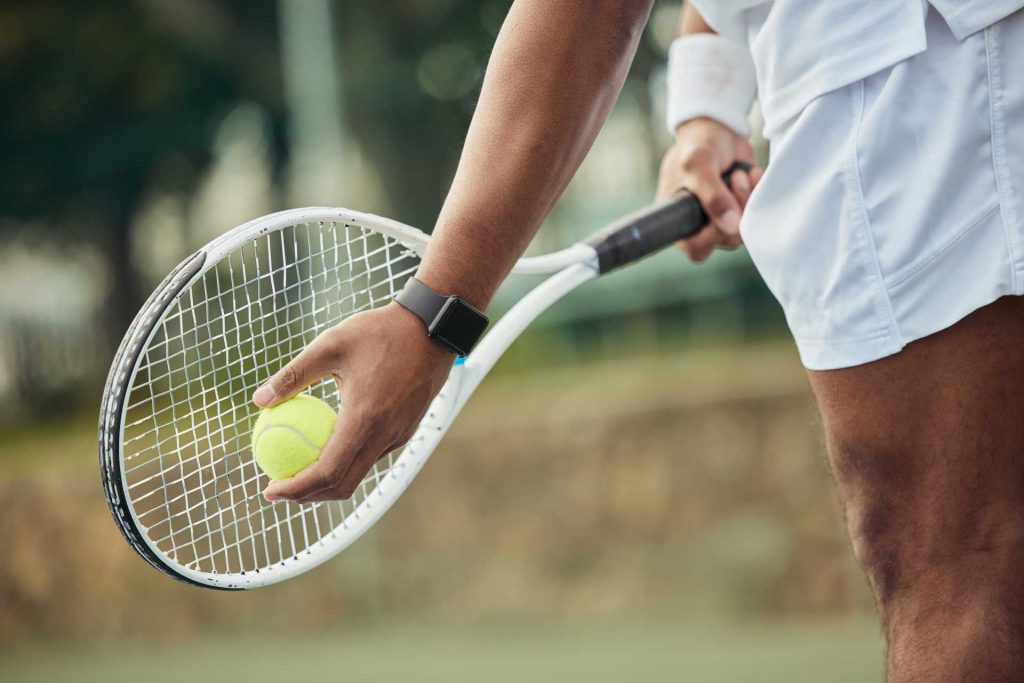 Wimbledon season 2026, A shot of an tennis player with a racket, ready to serve.