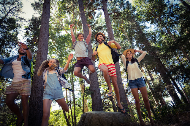 How to keep teenagers entertained in summer, teenagers enjoying the outdoors together.